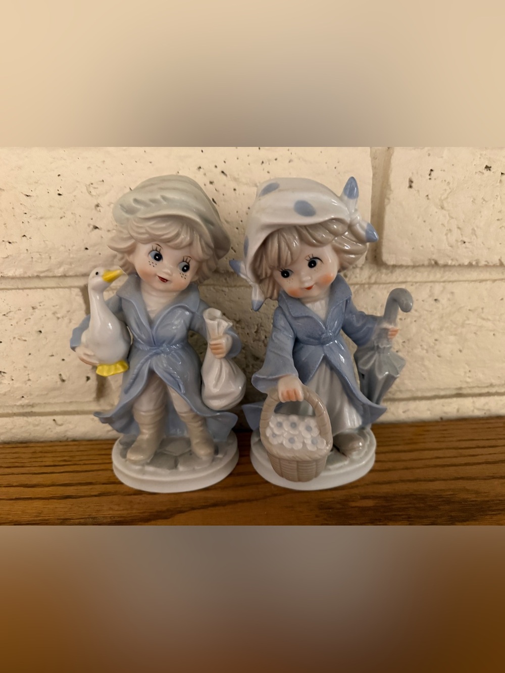 KPM Berlin Blue and Cream Porcelain Boy and Girl Figurine Pair